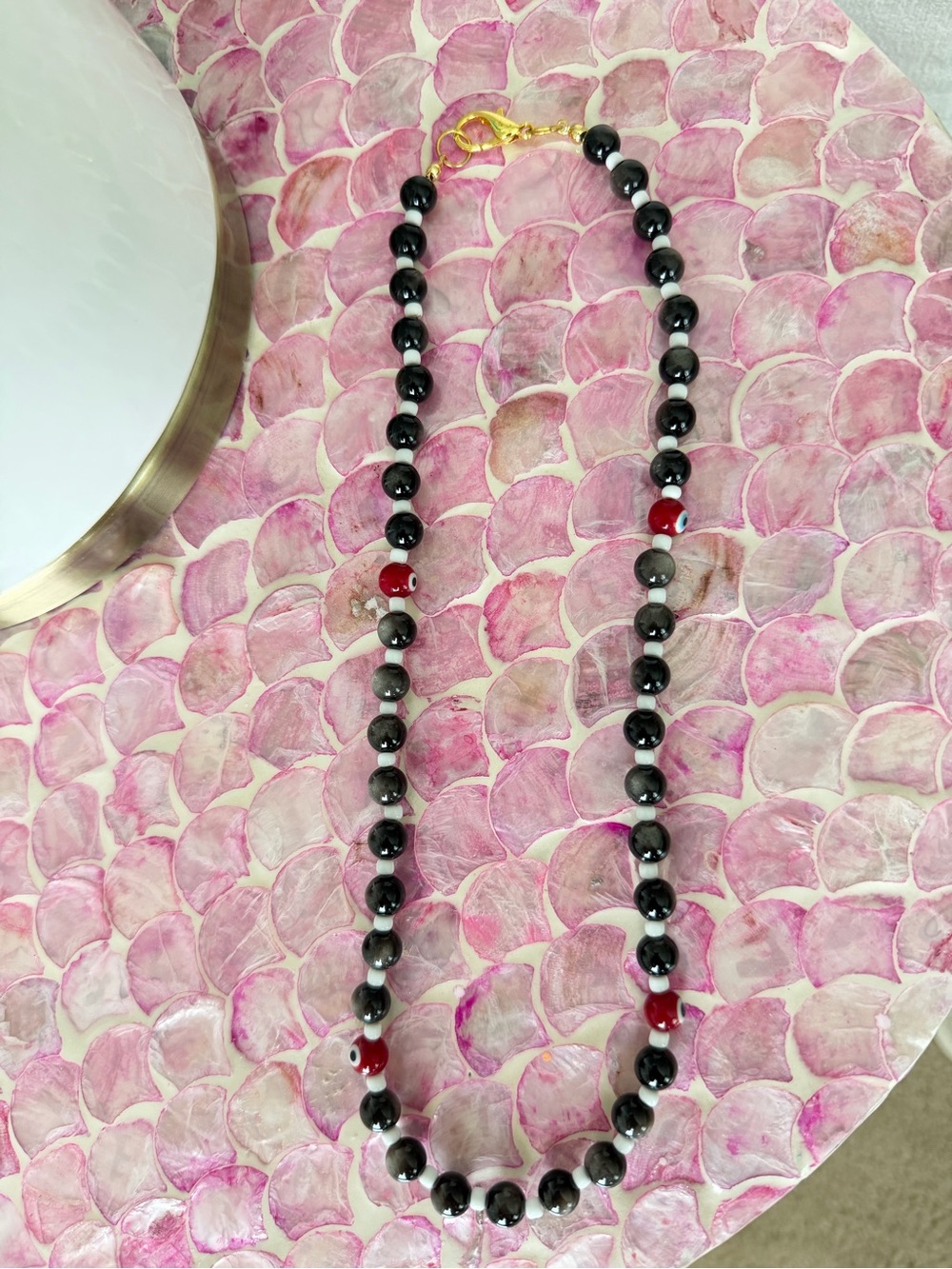 Handmade Black Beaded Necklace with Red Accents